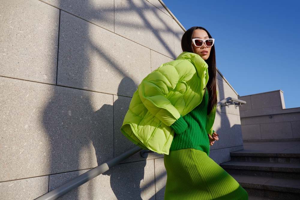 Aspiring fashion model posing confidently during a photoshoot.