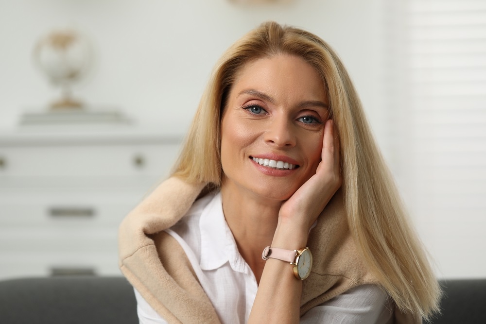 A confident mature model posing for a photoshoot.