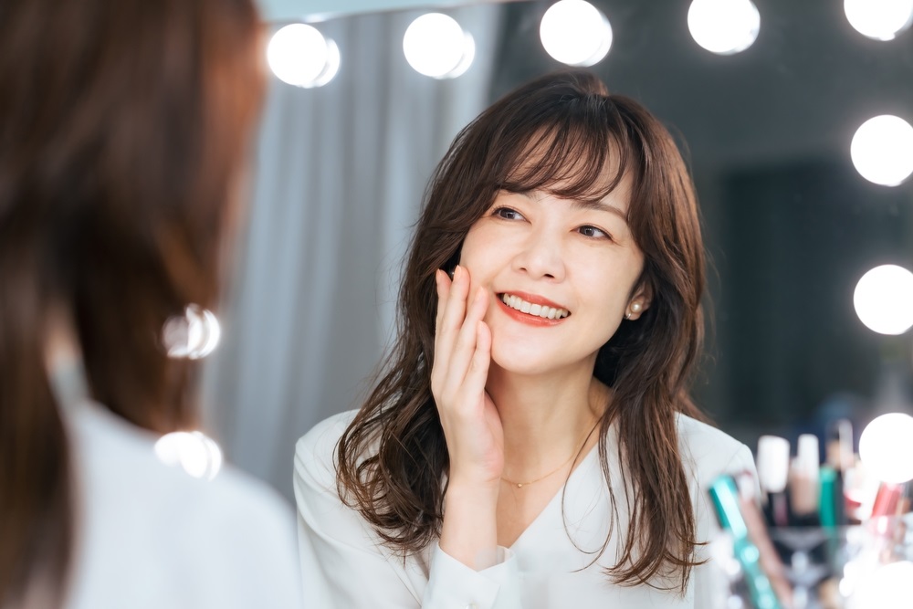 A confident mature model posing for a photoshoot.