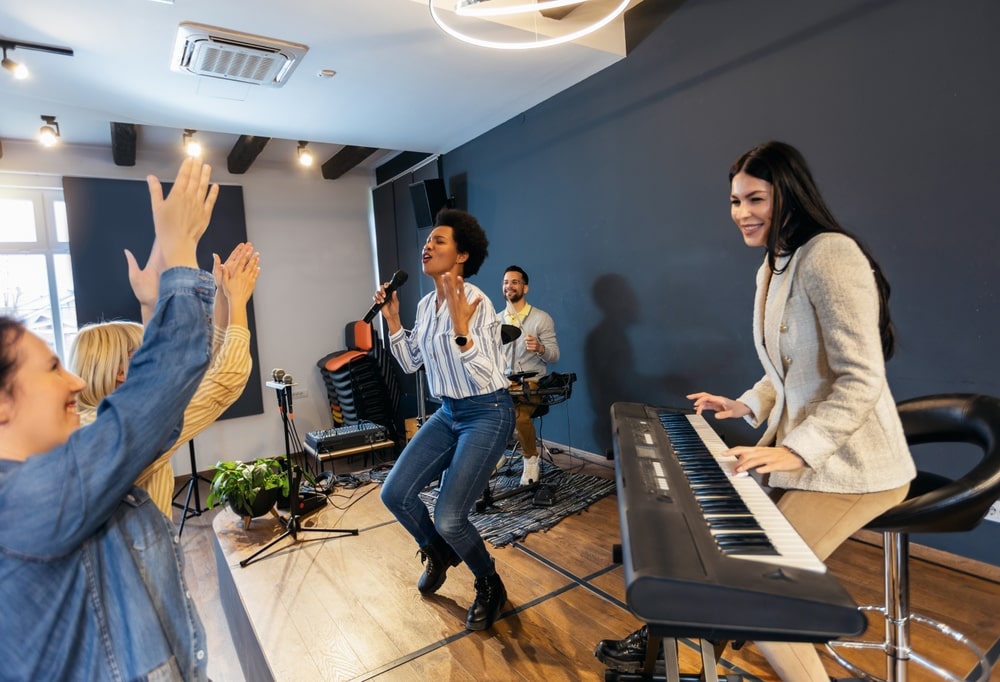 A vocalist recording in a professional studio for a commercial.