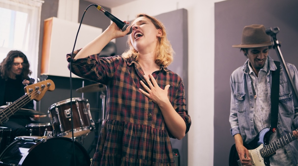 Freelance singer preparing for a performance and singing job audition in 2025.