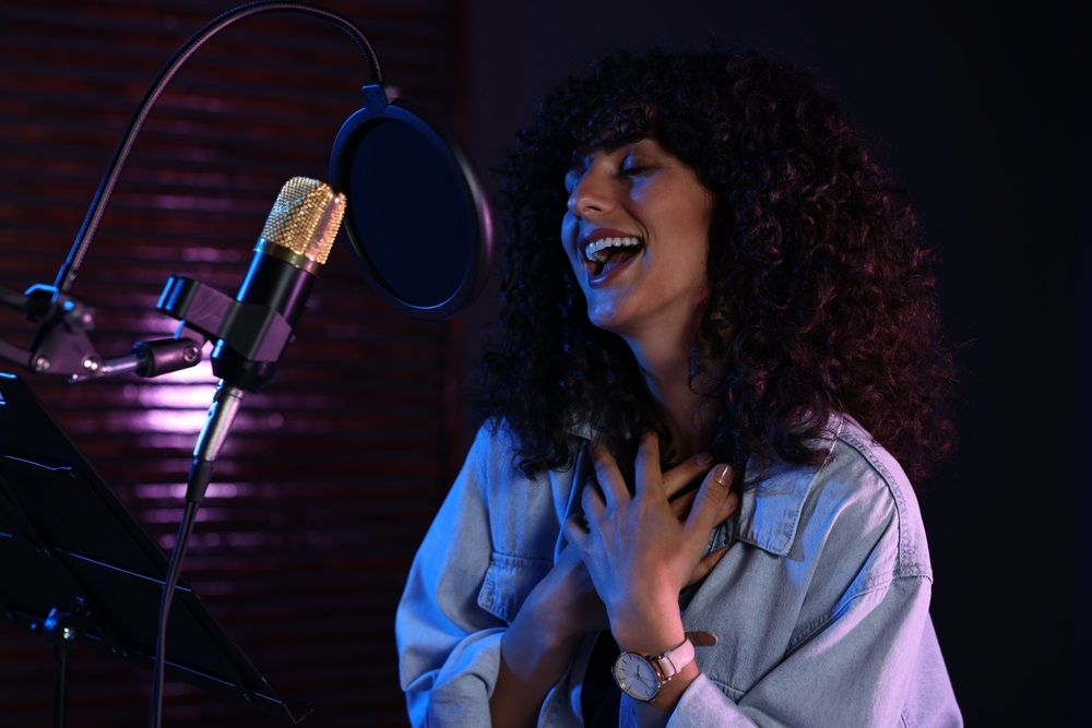 Freelance singer preparing for a performance and singing job audition in 2025.